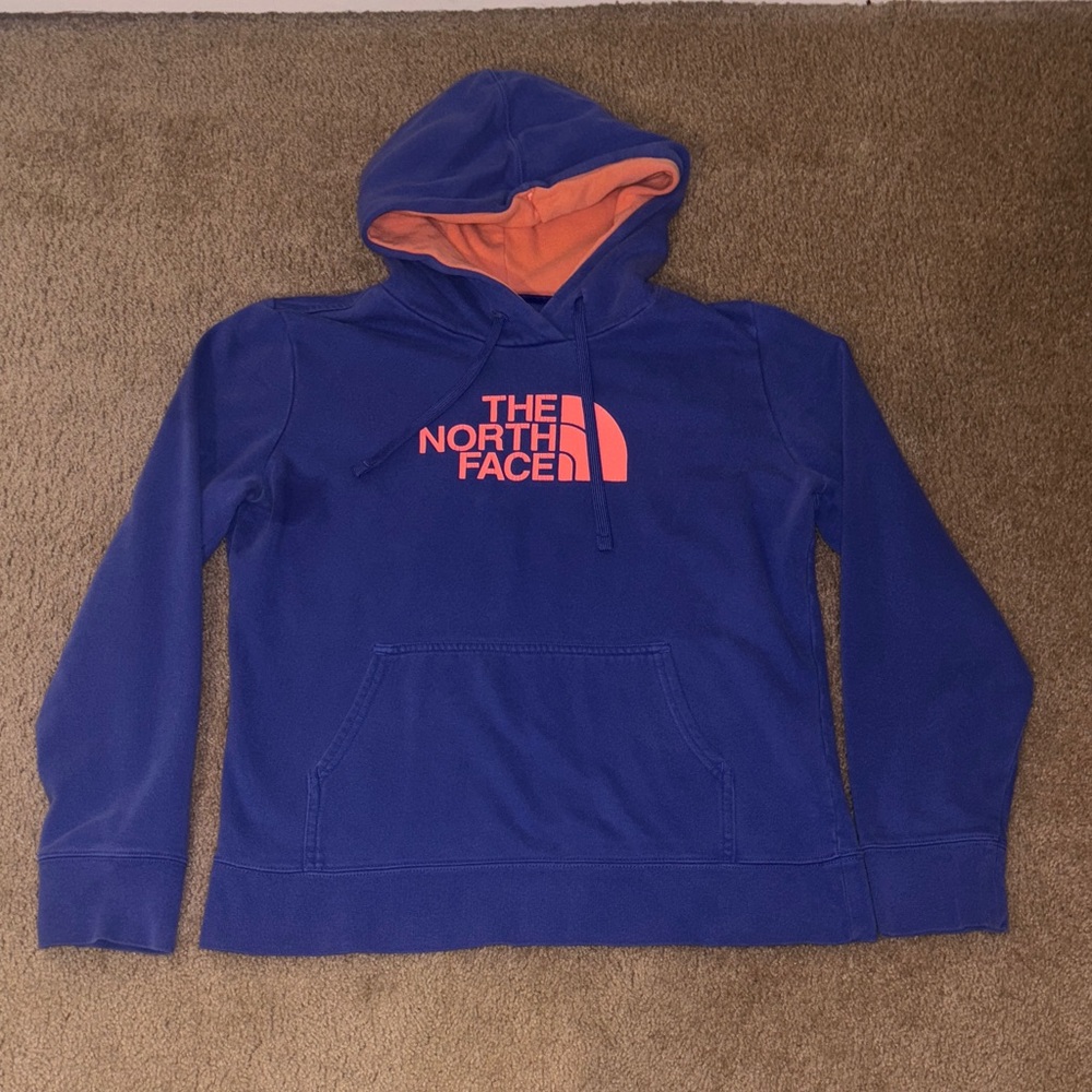 The North Face Royal Blue Hoodie with Vibrant Orange Accents